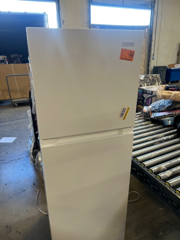 Photo 2 of 10.1 cu. ft. Top Freezer Refrigerator in White - Vissani
- minor dents 