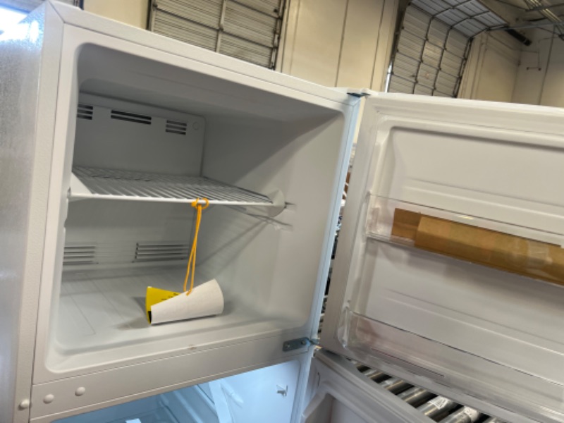 Photo 7 of 10.1 cu. ft. Top Freezer Refrigerator in White - Vissani
- minor dents 