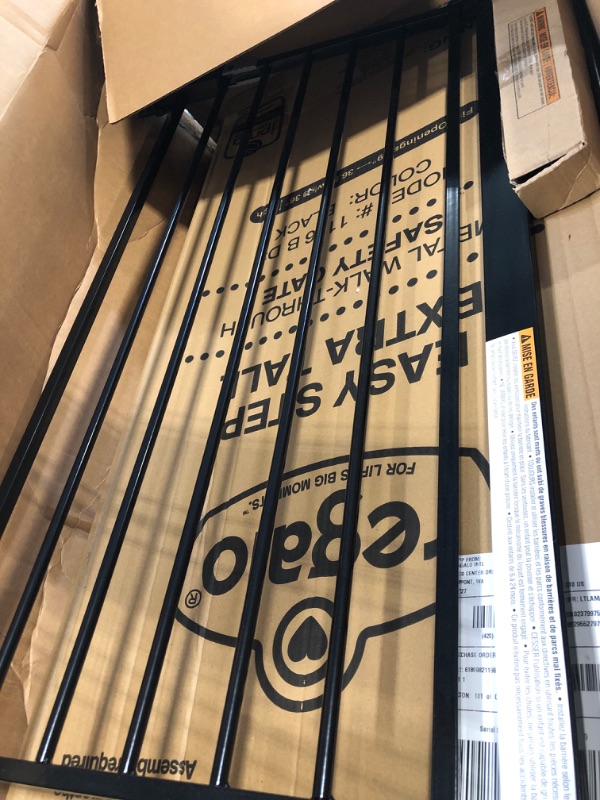 Photo 1 of Regalo Easy Step Extra Tall Walk Thru Baby Gate, Bonus Kit, Includes 4-Inch Extension Kit, Pressure Mount Kit and Wall Cups and Mounting Kit, Black, 4 Count (Pack of 1)