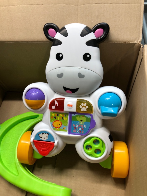 Photo 3 of Fisher-Price Learn with Me Zebra Walker, musical baby activity and walking toy with learning content Frustration-Free Packaging

*Needs batteries, unable to test