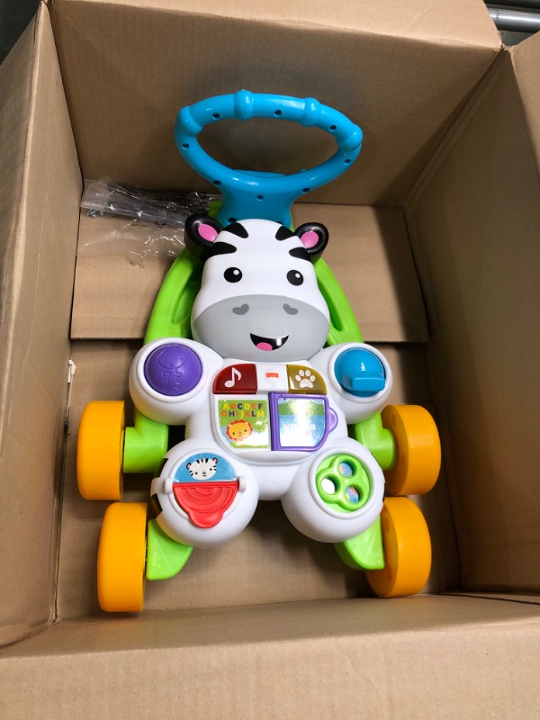 Photo 2 of Fisher-Price Learn with Me Zebra Walker, musical baby activity and walking toy with learning content Frustration-Free Packaging

*Needs batteries, unable to test