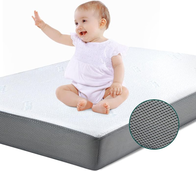 Photo 1 of BABELIO Premium Memory Foam Crib Mattresses, 2-Stage, Cool Gel, with Waterproof Lining & Removable Mattress Cover, for Standard Crib & Toddler Bed (White and Grey)