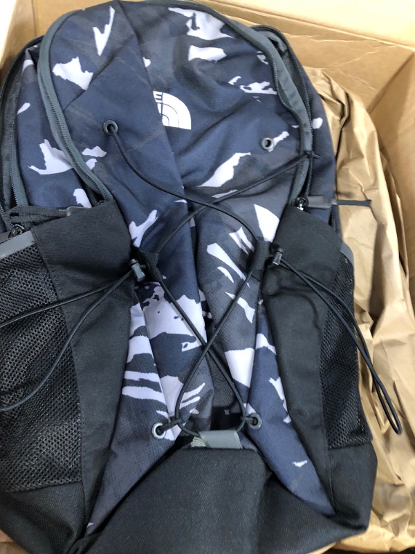 Photo 2 of  THE NORTHFACE NAVY BLUE CAMO backpack