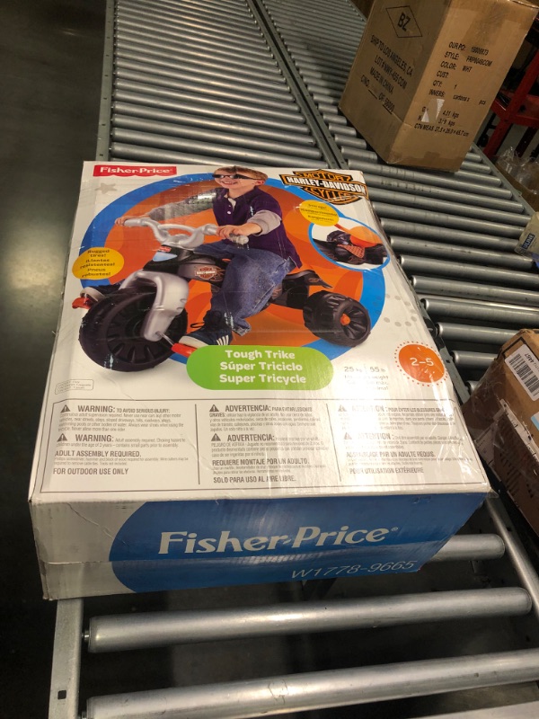 Photo 1 of Fisher-Price Harley-Davidson Tricycle with Handlebar Grips and Storage Area, Multi-Terrain Tires, Tough Trike [Amazon Exlclusive]