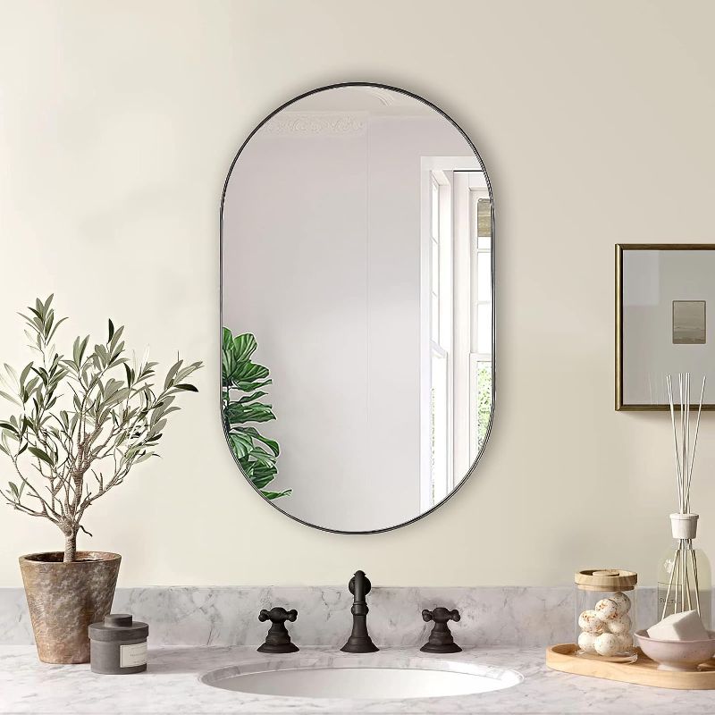 Photo 1 of ANDY STAR Black Oval Mirror, 20x33’’ Oval Mirrors for Bathroom, Pill Shaped Mirror, Black Mirror Vanity, Modern Oval Black Mirror for Bathroom Stainless Steel Metal Framed Wall-Mounted Mirrors
