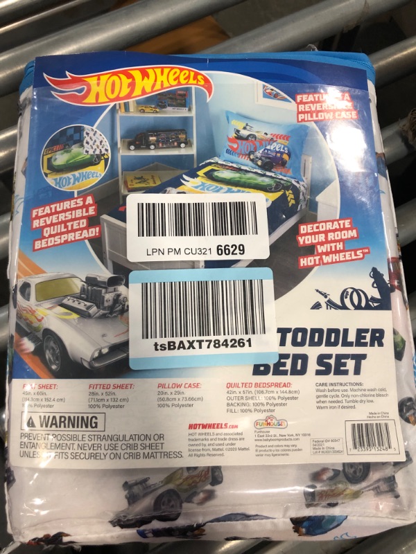 Photo 1 of Hot Wheels Race Car 4-Piece Toddler Bedding Set - Includes Quilted Comforter, Fitted Sheet, Top Sheet, and Pillow Case, 28" x 52"