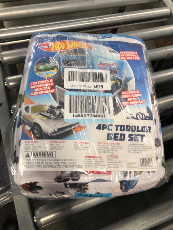 Photo 1 of Hot Wheels Race Car 4-Piece Toddler Bedding Set - Includes Quilted Comforter, Fitted Sheet, Top Sheet, and Pillow Case, 28" x 52"