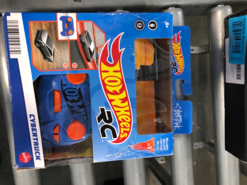 Photo 1 of Hot Wheels RC 1:64 Scale Rechargeable Radio-Controlled Racing Cars For On- Or Off-Track Play, Includes Car, Controller & Adapter For Kids 5 Years Old & Up Tesla Cybertruck