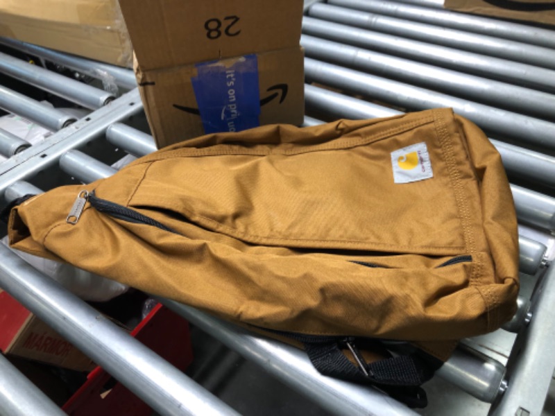 Photo 4 of Carhartt Mono Sling Backpack, Unisex Crossbody Bag for Travel and Hiking, Carhartt Brown Carhartt Brown logo