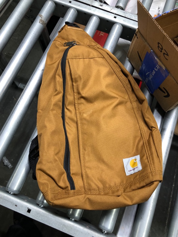 Photo 3 of Carhartt Mono Sling Backpack, Unisex Crossbody Bag for Travel and Hiking, Carhartt Brown Carhartt Brown logo