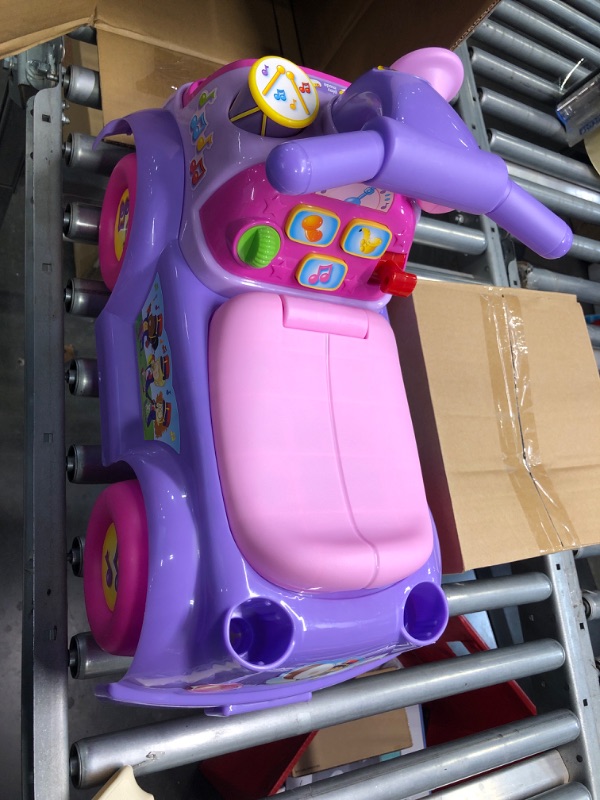 Photo 2 of Fisher Price Music Parade Purple Ride-On with 5 Different Marching Tunes! [Amazon Exclusive]
