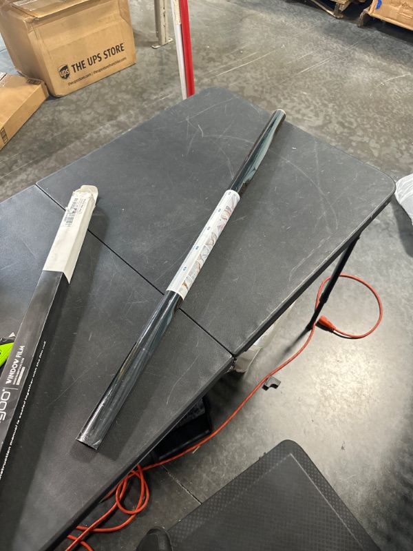 Photo 1 of rabbitgoo One Way Window Film Daytime Privacy Mirror Window Tint for Home Office, Heat Control Sun Blocking Anti UV Reflective Tinting Film Glass Window & Door Covering, 35.4 Inch X 13.1 Feet, Black 35.4" x 157" Black