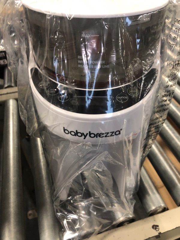 Photo 1 of New and Improved Baby Brezza Formula Pro Advanced Formula Dispenser Machine - Automatically Mix a Warm Formula Bottle Instantly - Easily Make Bottle with Automatic Powder Blending