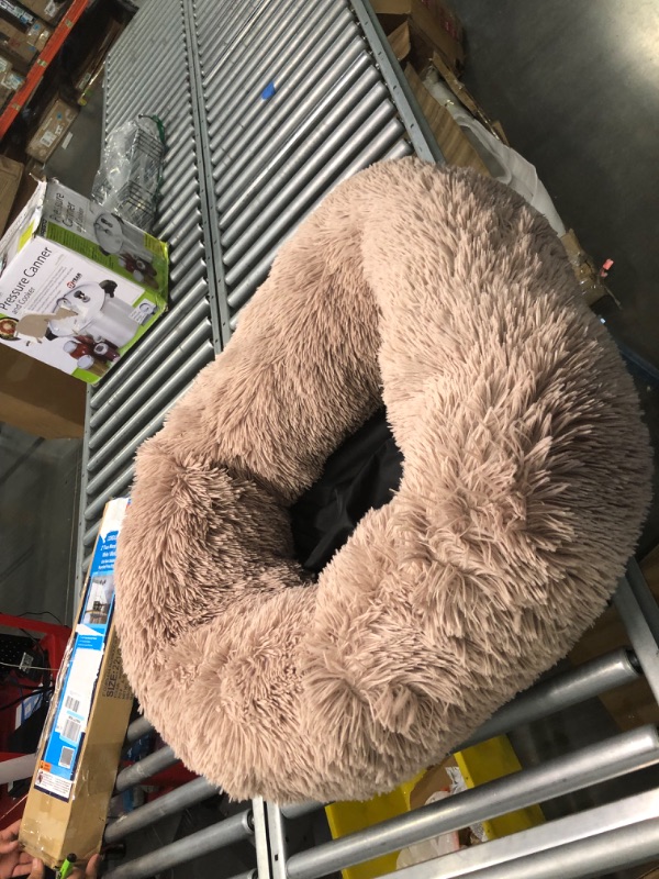 Photo 1 of Bedsure Calming Dog Beds for Small Medium Large Dogs - Round Donut Washable Dog Bed, Anti-Slip Faux Fur Fluffy Donut Cuddler Anxiety Cat Bed, Fits up to 15-100 lbs 23x23x8 Inch (Pack of 1) Camel