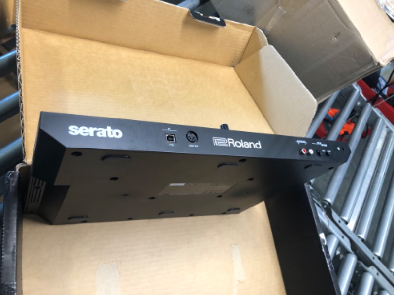 Photo 1 of Roland Two-channel, Four-deck Serato DJ Controller with Serato DJ Pro upgrade (DJ-202) Two-Channel, Four-Deck with Serato DJ Pro Controller