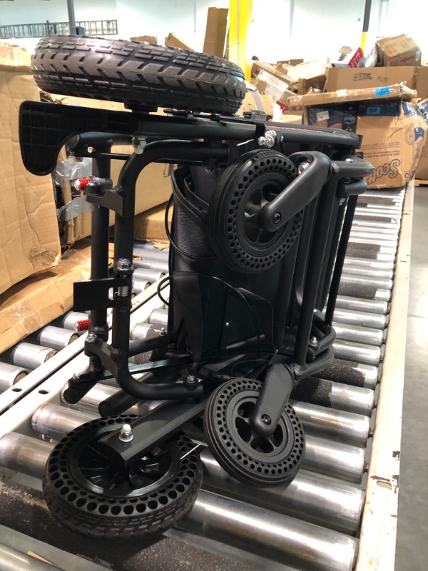 Photo 6 of Medwarm Portable Aluminum Transport Wheelchair with Handbrake, 11" Rear Wheels, Compact Wheelchair, Ultralight Folding Travel Wheelchair for Adults, Black (Seat Width:15.75") Black Standard
