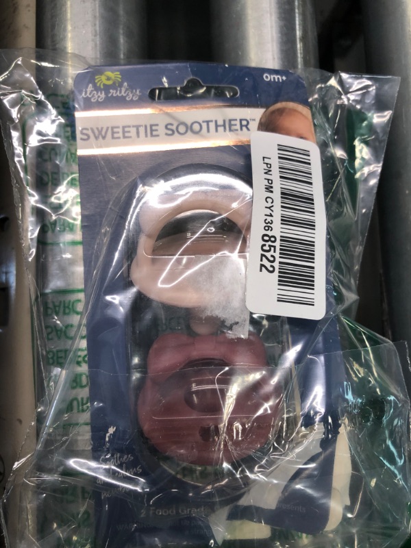 Photo 1 of Itzy Ritzy Sweetie Soother Pacifier Set of 2 - Silicone Newborn Pacifiers with Collapsible Handle & Two Air Holes for Added Safety; Set of 2 in Clay & Rosewood, Ages Newborn & Up Clay & Rosewood 2 Count (Pack of 1)