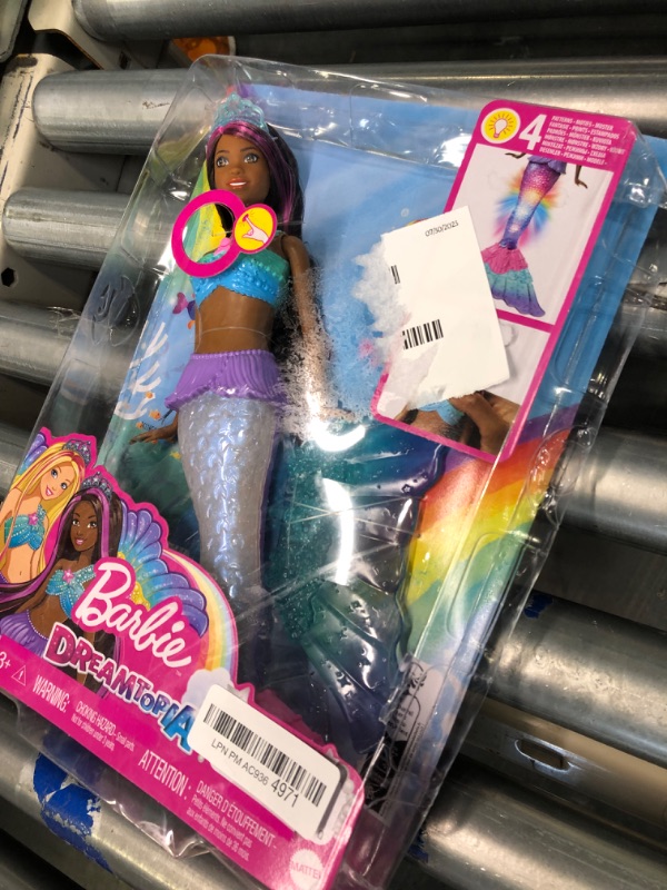 Photo 1 of Barbie Dreamtopia Doll, Mermaid Toy with Water-Activated Light-Up Tail, Purple-Streaked Hair & 4 Colorful Light Shows Modern Multicolor