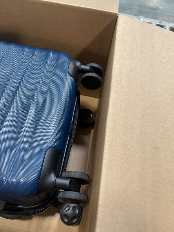 Photo 1 of Amazon Basics 21-Inch Hardside Spinner, Navy Blue Navy Blue 21-inch Spinner