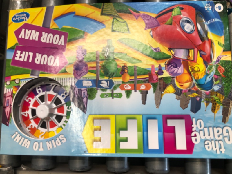 Photo 1 of Hasbro Gaming The Game of Life Game, Family Board Game for 2-4 Players, Indoor Game for Kids Ages 8 and Up, Pegs Come in 6 Colors
