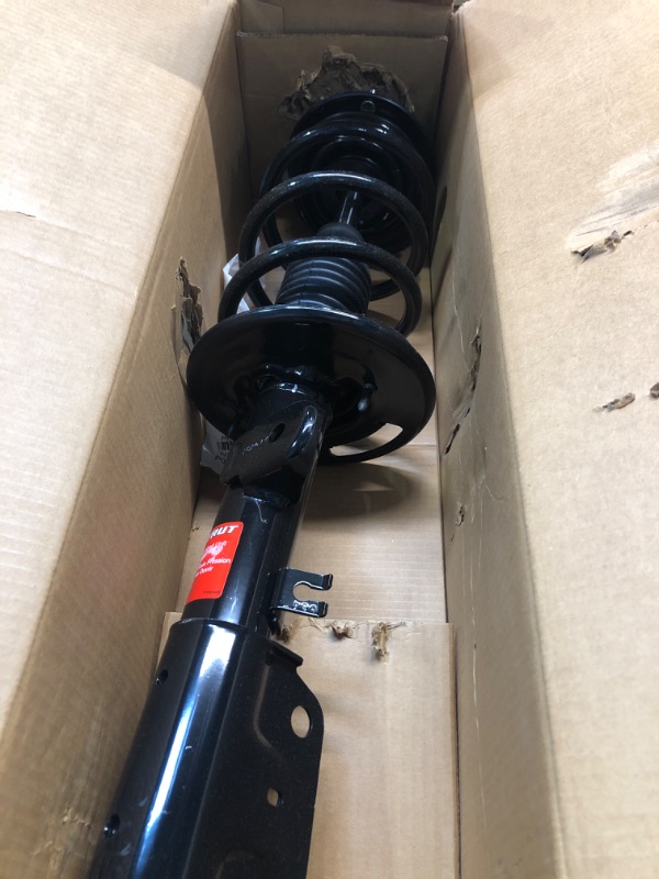 Photo 1 of Monroe Shocks & Struts Quick-Strut 272729 Strut and Coil Spring Assembly