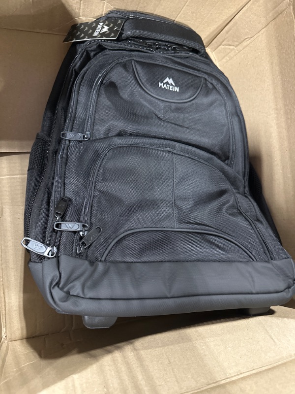 Photo 1 of Rolling Backpack, MATEIN 17 inch Water Resistant Wheeled Laptop Backpack, Carry on Luggage Business Bag, College Student Computer Bookbag Trolley Suitcase for Men Women Adults to Travel, Black 17-inch Black