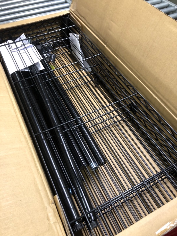 Photo 3 of Amazon Basics 4-Shelf Adjustable, Heavy Duty Storage Shelving Unit (350 lbs loading capacity per shelf), Steel Organizer Wire Rack, Black (36L x 14W x 54H) Black 4-Shelf Storage Unit without Caster