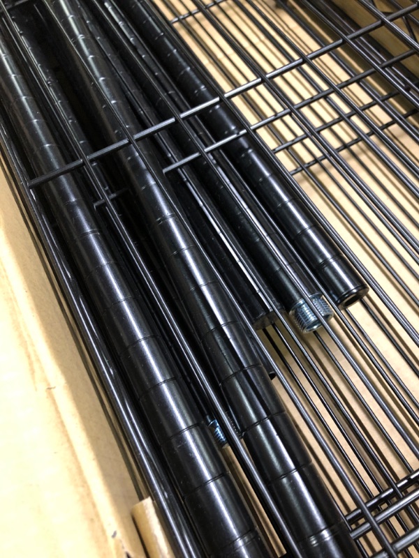 Photo 1 of Amazon Basics 4-Shelf Adjustable, Heavy Duty Storage Shelving Unit (350 lbs loading capacity per shelf), Steel Organizer Wire Rack, Black (36L x 14W x 54H) Black 4-Shelf Storage Unit without Caster