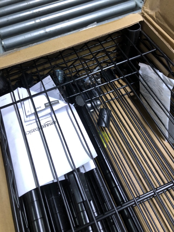 Photo 5 of Amazon Basics 4-Shelf Adjustable, Heavy Duty Storage Shelving Unit (350 lbs loading capacity per shelf), Steel Organizer Wire Rack, Black (36L x 14W x 54H) Black 4-Shelf Storage Unit without Caster