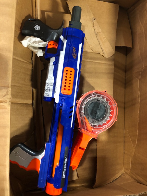 Photo 1 of Nerf Rampage N-Strike Elite Toy Blaster with 25 Dart Drum Slam Fire for Kids, Teens, & Adults (Amazon Exclusive)
