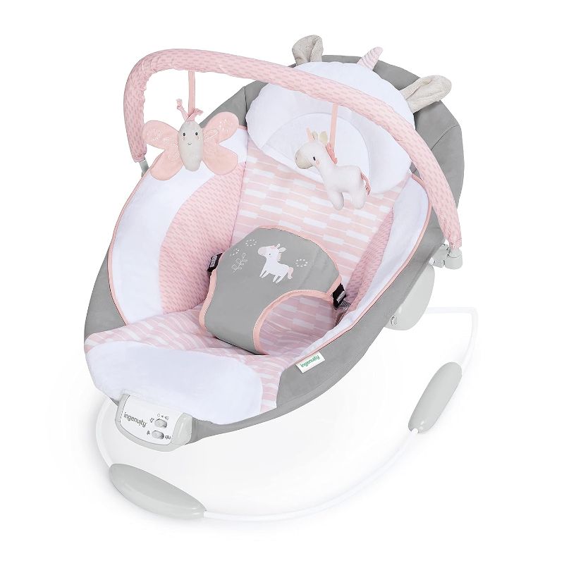 Photo 1 of Ingenuity Soothing Baby Bouncer Infant Seat with Vibrations, -Toy Bar & Sounds, 0-6 Months Up to 20 lbs (Pink Flora the Unicorn)