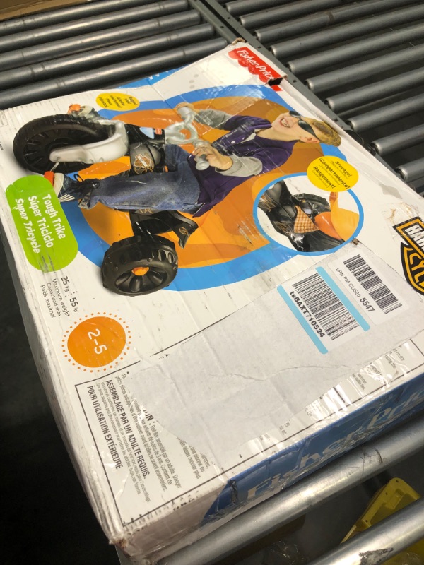 Photo 2 of Fisher-Price Harley-Davidson Tricycle with Handlebar Grips and Storage Area, Multi-Terrain Tires, Tough Trike [Amazon Exclusive]