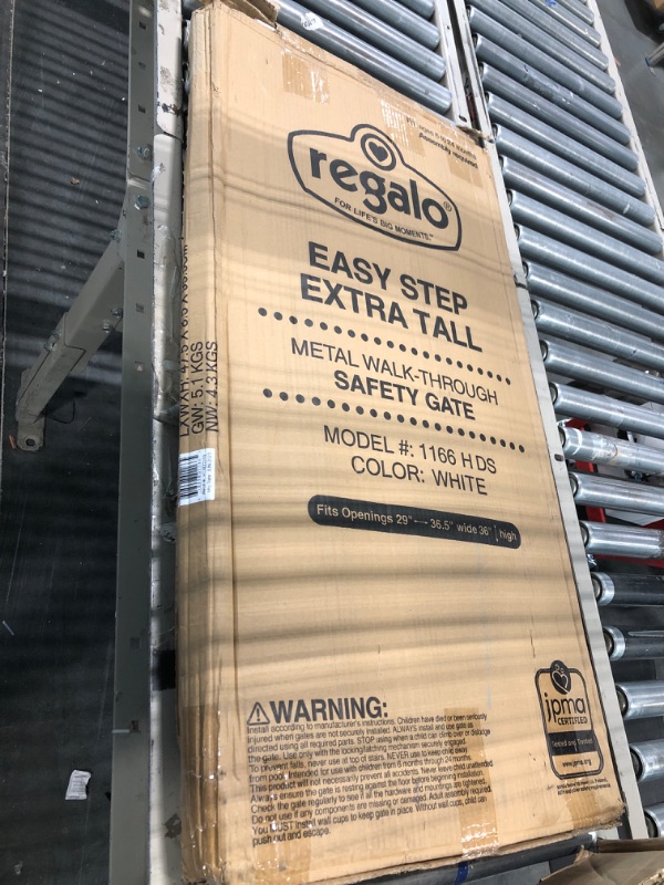 Photo 1 of Regalo Easy Step 36" Extra Tall Walk Thru Baby Gate, Includes 4-Inch Extension Kit, 4 Pack of Pressure Mount Kit and 4 Pack Wall Cups and Mounting Kit, Pack of 1 White