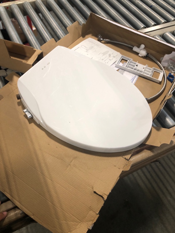 Photo 2 of American Standard 5900A05G.020 Aqua Wash Non-Electric Bidet Seat for Elongated Toilets, 14.9 in Wide x 3.6 in Tall x 21.1 in Deep, White
