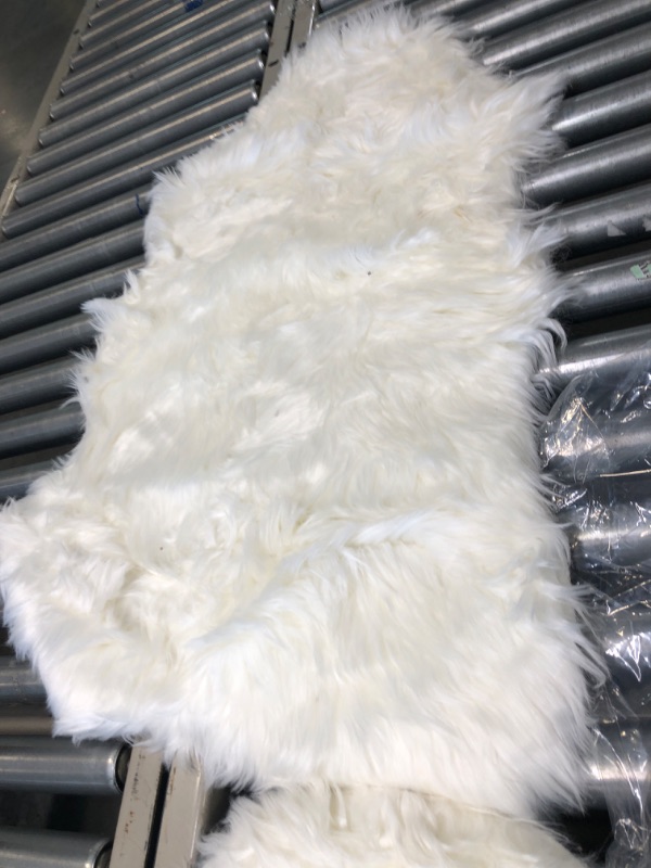 Photo 3 of Ashler Faux Fur Rug, Fluffy Shaggy Area Rug Ultra Soft 2 x 3 Feet Sheepskin Fur Rug, White Fuzzy Rug Machine Washable Shag Rug, Nursery Decor Throw Rugs for Bedroom, Kids Room, Living Room 2 x 3 ft White