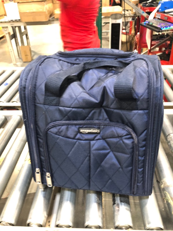 Photo 1 of Amazon Basics Underseat Carry-On Rolling Travel Luggage Bag, 14 Inches, Navy Blue Quilted Navy Blue Quilted Luggage Bag