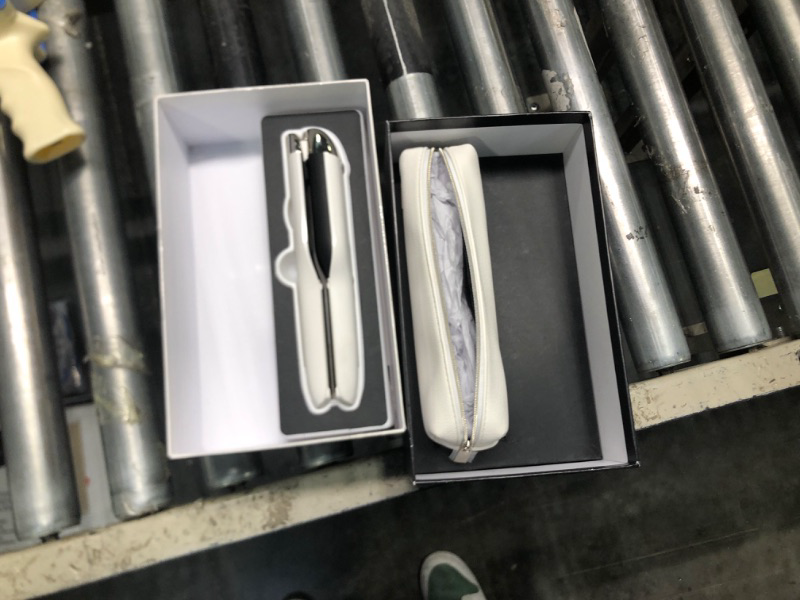 Photo 1 of appears new open box 