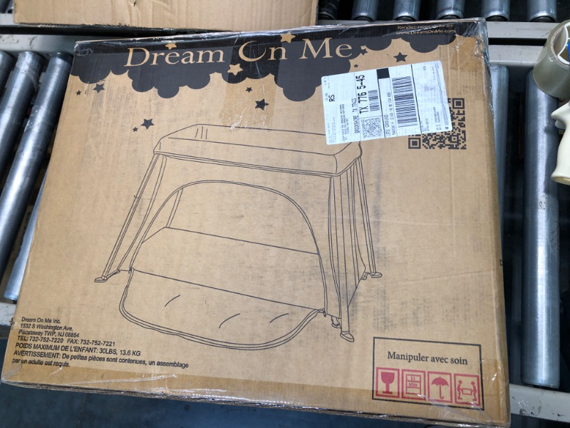 Photo 1 of Dream On Me Travel Light Playard with Mesh Zipper Door in Navy Navy Playard with Zipper Door