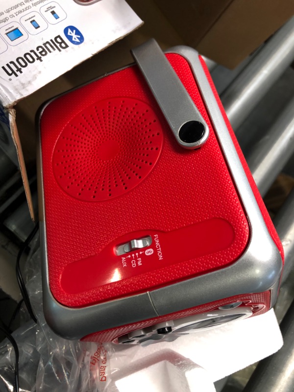 Photo 3 of 
Jensen CD-555RS Red CD Bluetooth Boombox Portable Bluetooth Music System with CD Player +CD-R/RW & FM Radio with Aux-in & Headphone Jack Line-in Limited Edition- (Red)Jensen CD-555RS Red CD Bluetooth Boombox Portable Bluetooth Music System with CD Play…