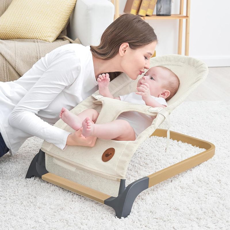 Photo 1 of ANGELBLISS Baby Bouncer, Portable Bouncer Seat for Babies, Infants Bouncy Seat with Mesh Fabric, Natural Vibrations (Beige)