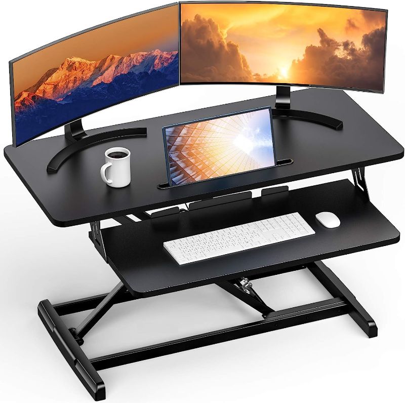 Photo 1 of  Standing Up Desk Converter Height Adjustable Sit Stand Desk with Removable Keyboard Tray, 35 Inch Large Desk Riser Ergonomic Gas Spring Dual Monitor Workstation for Home Office