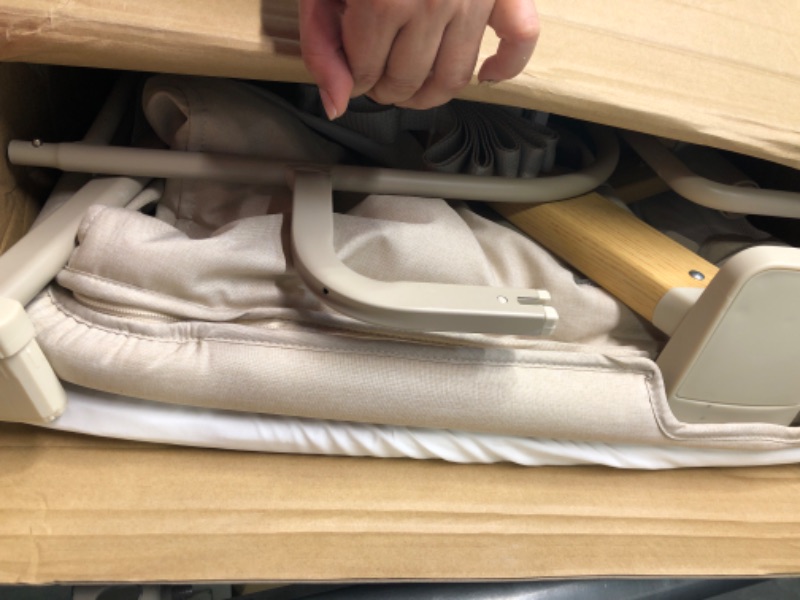 Photo 1 of Evolur Stellar Bassinet and Bedside Sleeper, Easy to Fold and Carry, Lightweight and Portable Baby Bassinet, Height Adjustable, Mattress Pad Included, Beige