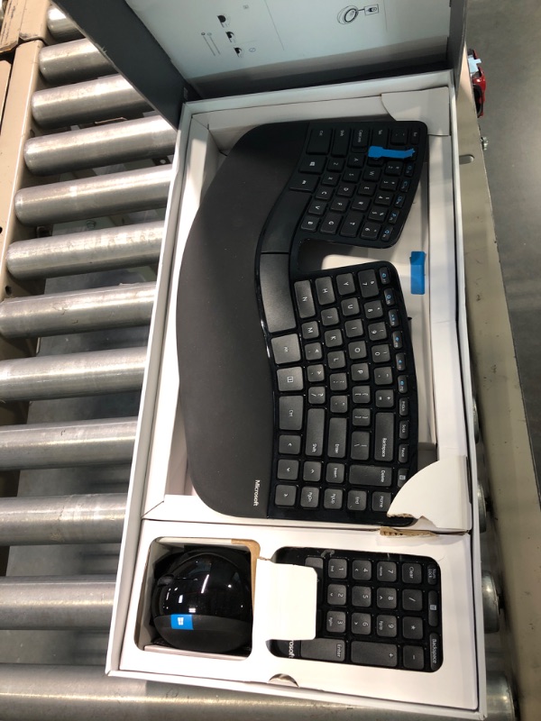 Photo 1 of Microsoft Sculpt Ergonomic Wireless Desktop Keyboard and Mouse - Black. Wireless , Comfortable, Ergonomic Keyboard and Mouse Combo with Split Design and Palm Rest.