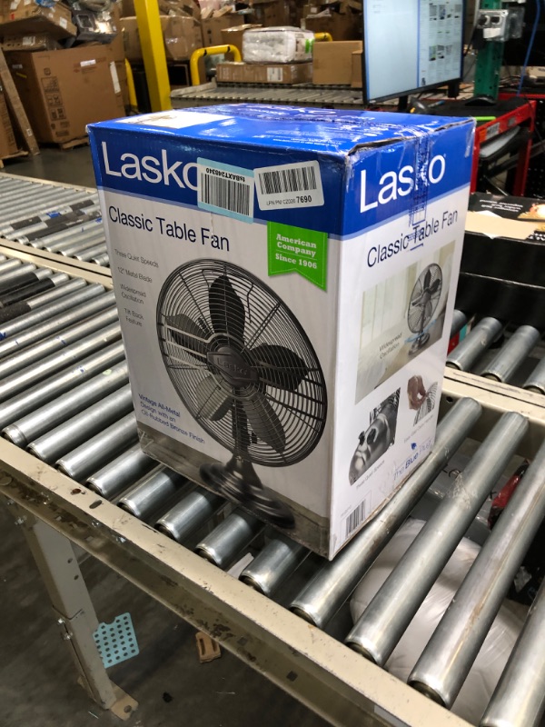 Photo 2 of Lasko 12" Classic Metal Table Fan - 12" Diameter - 3 Speed - Quiet, Carrying Handle, Oscillating - 17.3" Height x 13.3" Width - Metal