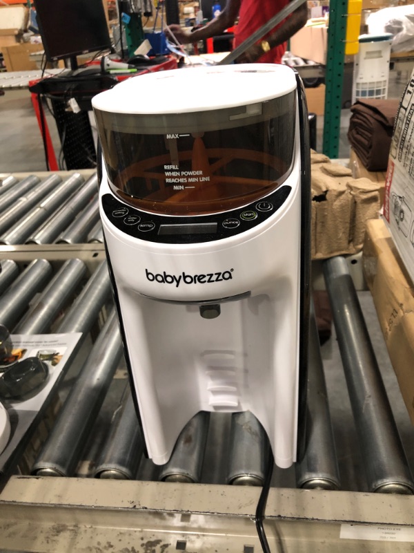 Photo 1 of New and Improved Baby Brezza Formula Pro Advanced Formula Dispenser Machine - Automatically Mix a Warm Formula Bottle Instantly - Easily Make Bottle with Automatic Powder Blending