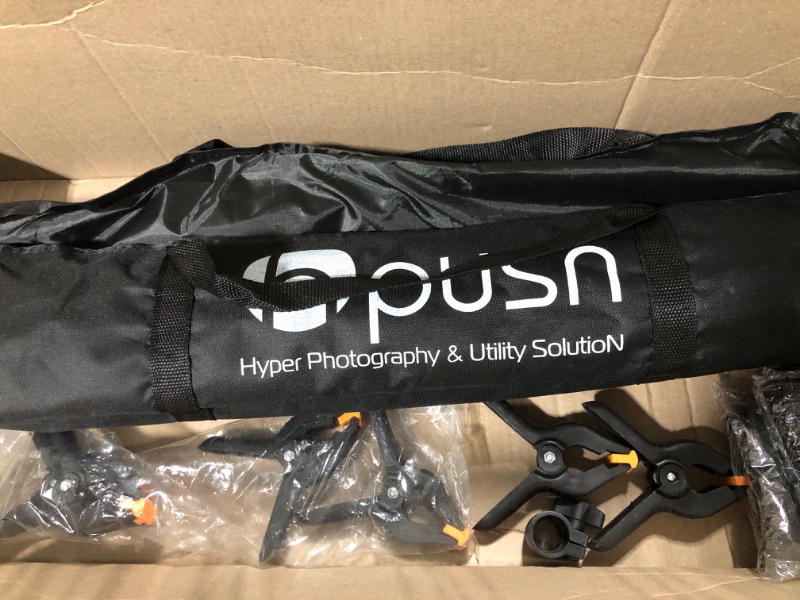 Photo 2 of HPUSN Backdrop Stand - 10ft x 7ft Adjustable Photoshoot Backdrop - Photo Backdrop Stand for Parties - Backdrop Includes Travel Bag, Sand Bags, Clamps - Photo Video Studio BS01

**MISSING SECOND TRIPOD AND 2 CLAMPS
**SOLD FOR PARTS