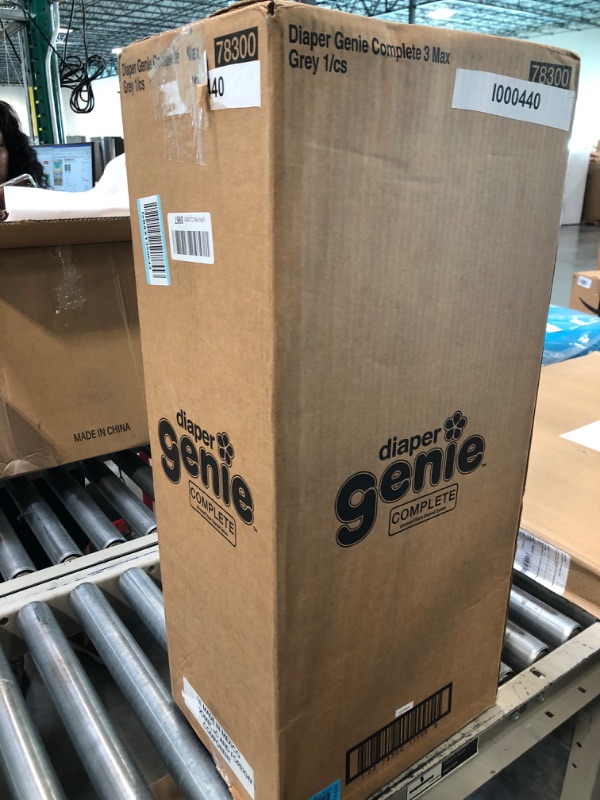 Photo 1 of Diaper Genie Complete Diaper Pail (Grey) with Odor Control | Includes 1 Diaper Trash Can, 3 Refill Bags, 1 Carbon Filter Grey Pail + 3 Refill Diaper Pail