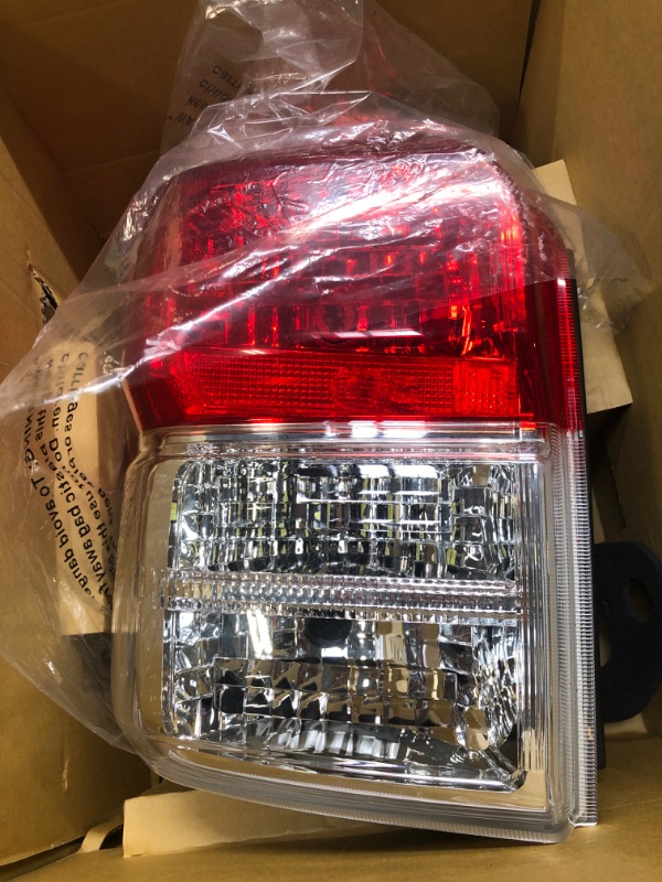 Photo 2 of TYC 11-6506-00-1 Toyota 4Runner Left Replacement Tail Lamp NSF Certified