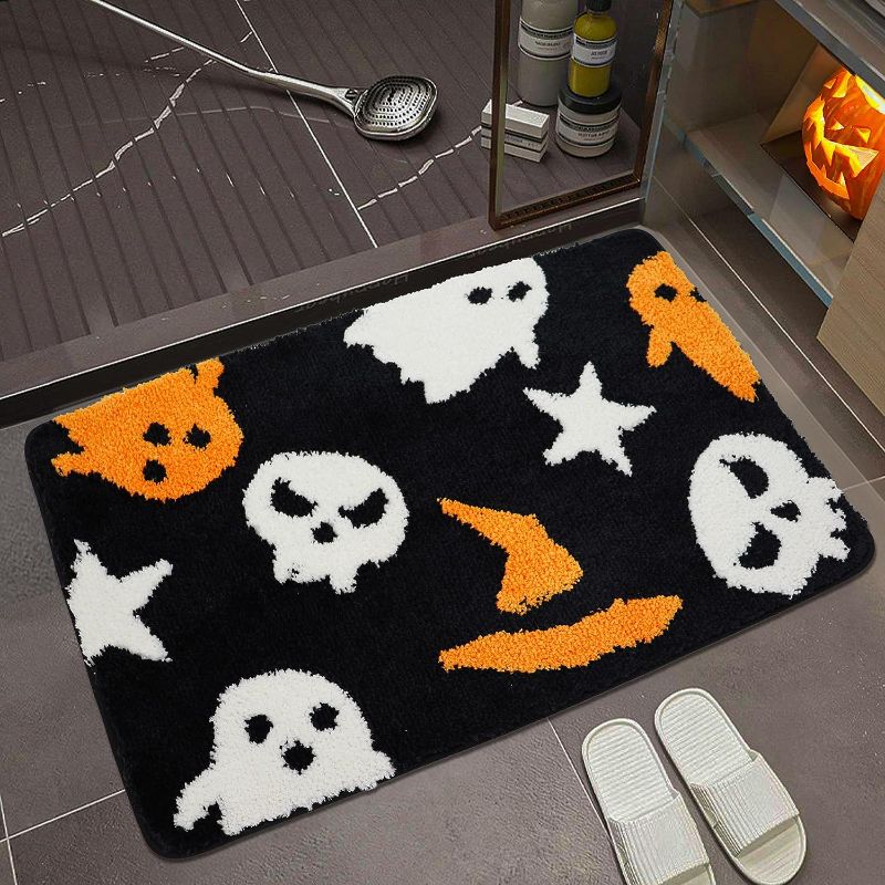 Photo 1 of Aorsost Spider Web Skull Bath Mat Halloween Bathroom Rug Non-Slip Bath Mats Gothic Home Decor Horror Scary Doormat Carpet for Kitchen Bedroom (31.5"x15.7"-Orange)