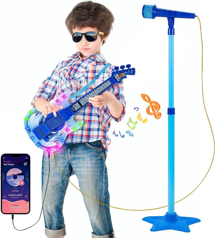 Photo 1 of ackage Included:Contains with 1 electric guitar, 1 speaker microphone, 1 adjustable microphone stand, 1 strap, 1 connection line and 1 screwdriver.This guitar and microphone toy is powered by 3 AA batteries (not included).Perfect for beginners who want to